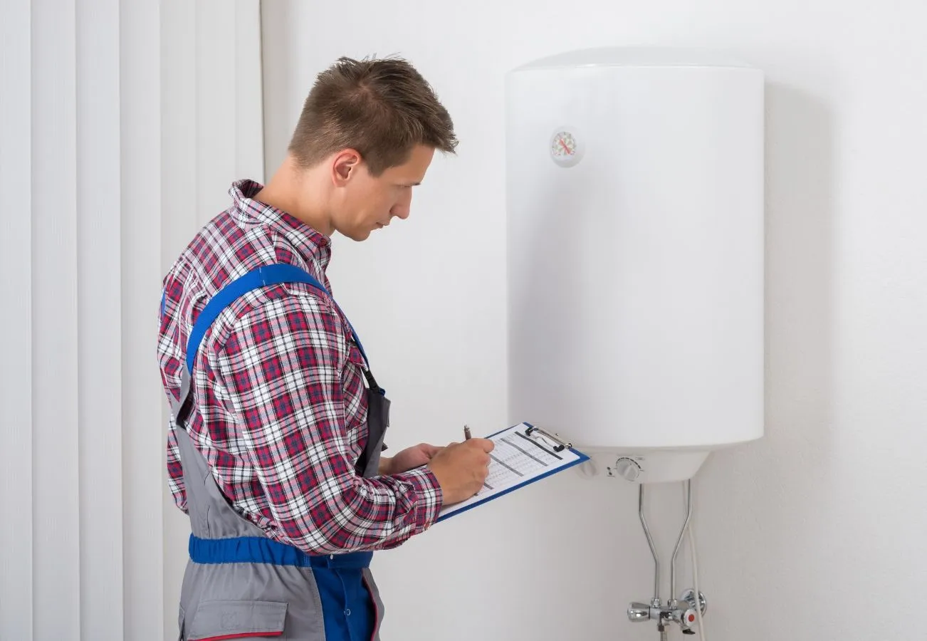 Engineer servicing a gas boiler
